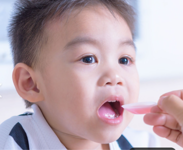 Child3 Ttaking Medicine